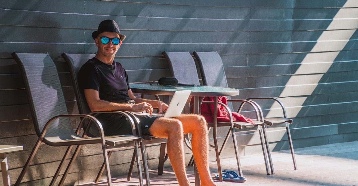 Man, laptop, work — A Comprehensive Breakdown of ABA Therapist Roles for Your Resume