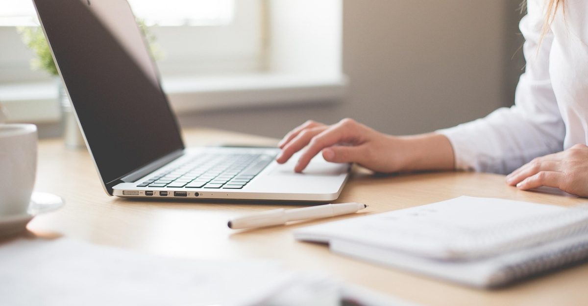 Notebook, work, girl — Unleash Your Sound with Online Music Mastering